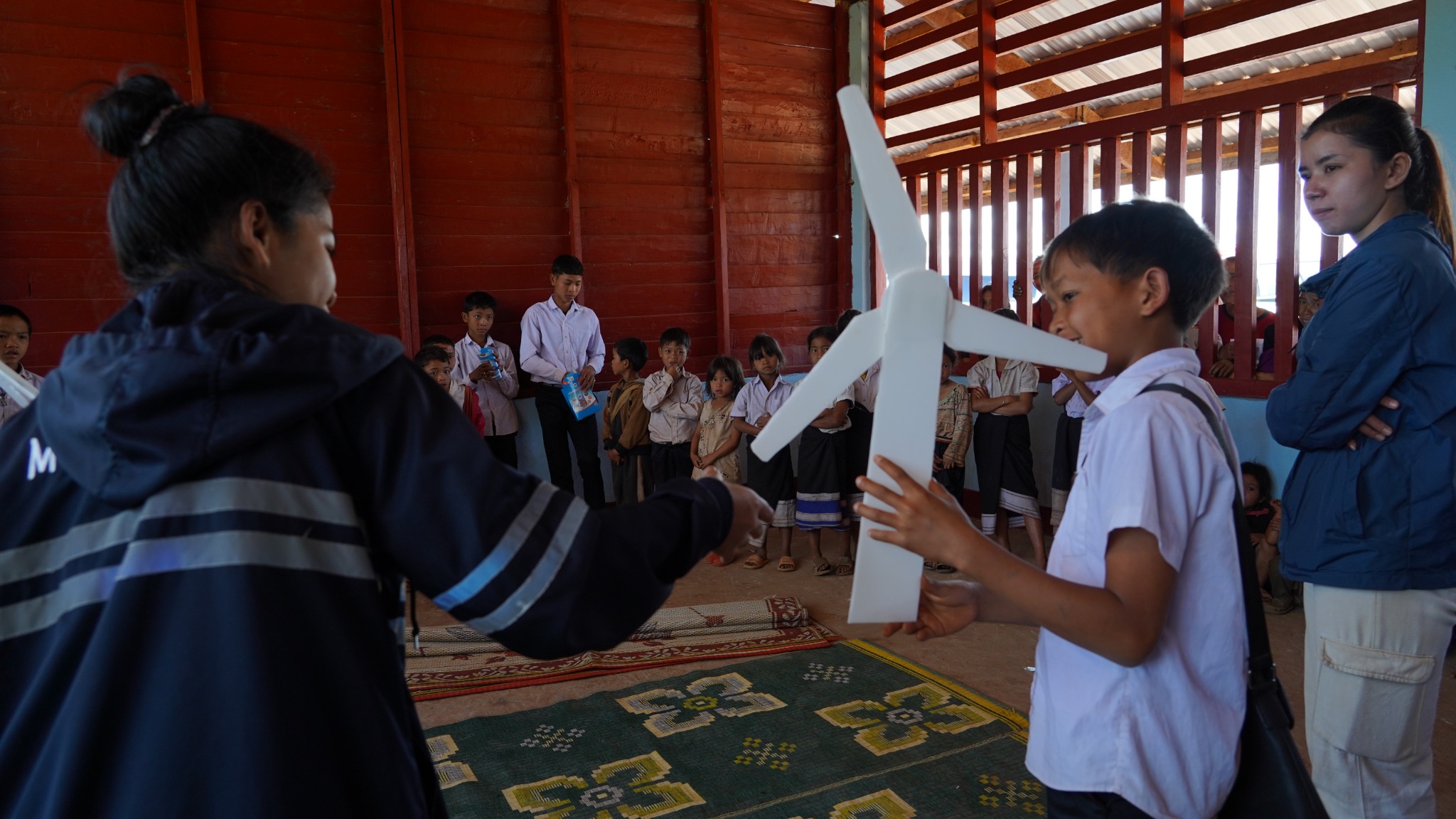 Students participating in a wind-energy learning activity